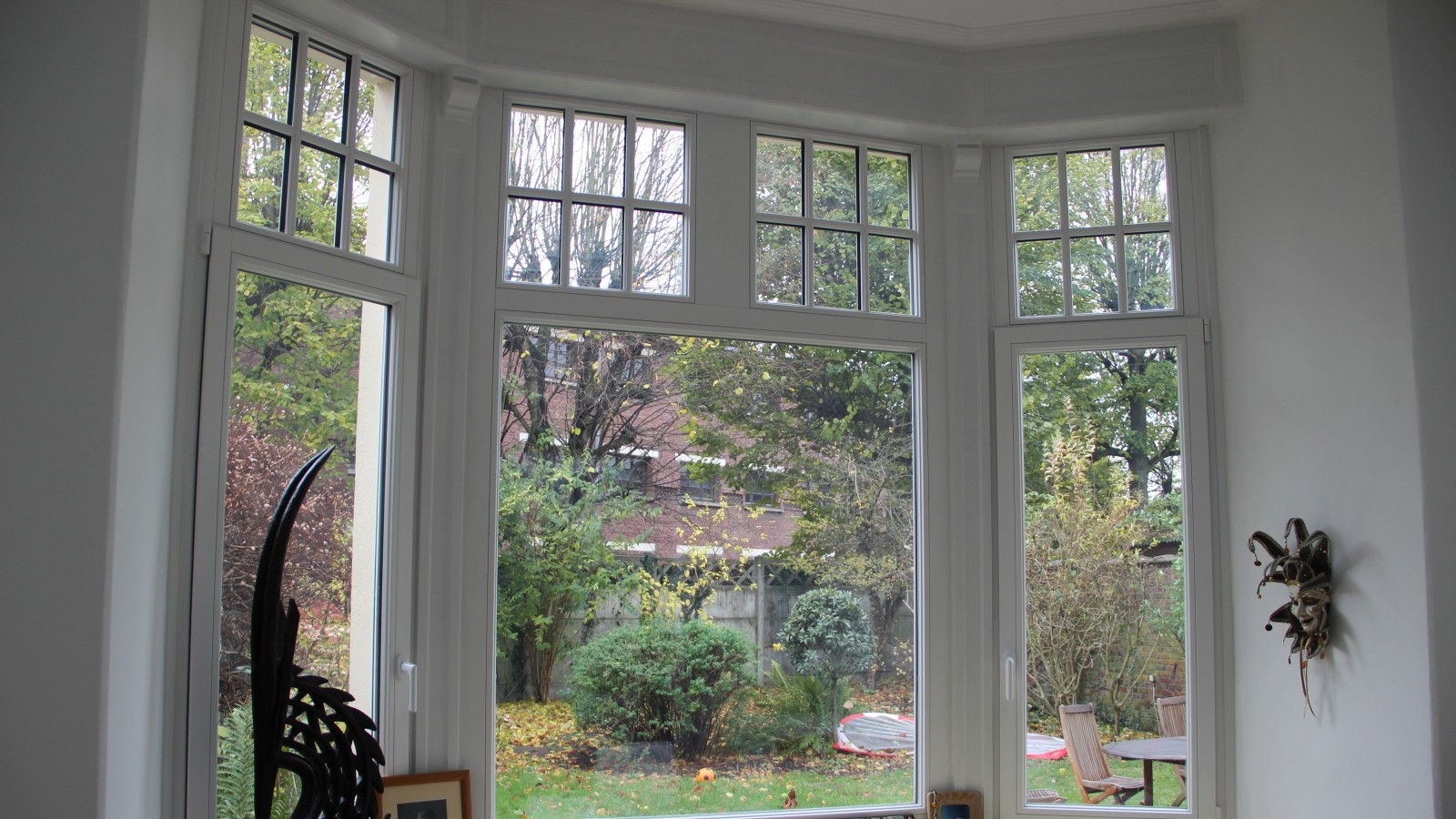 Fenêtre bow window avec petit bois et ouvrant à la française - Komilfo