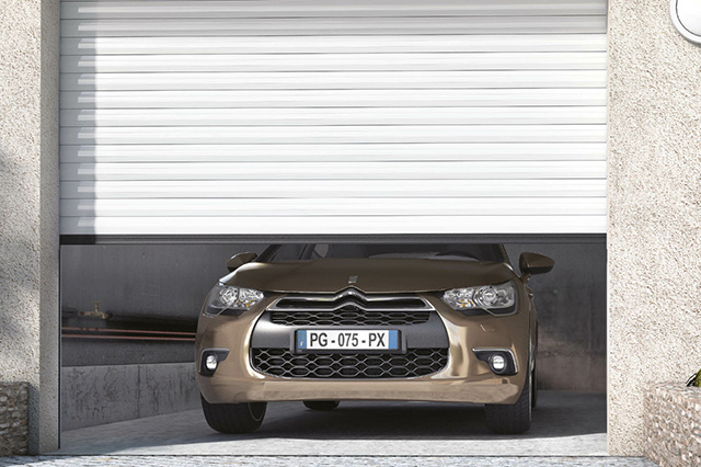 Porte de garage enroulable sur-mesure - Alu, PVC, bois