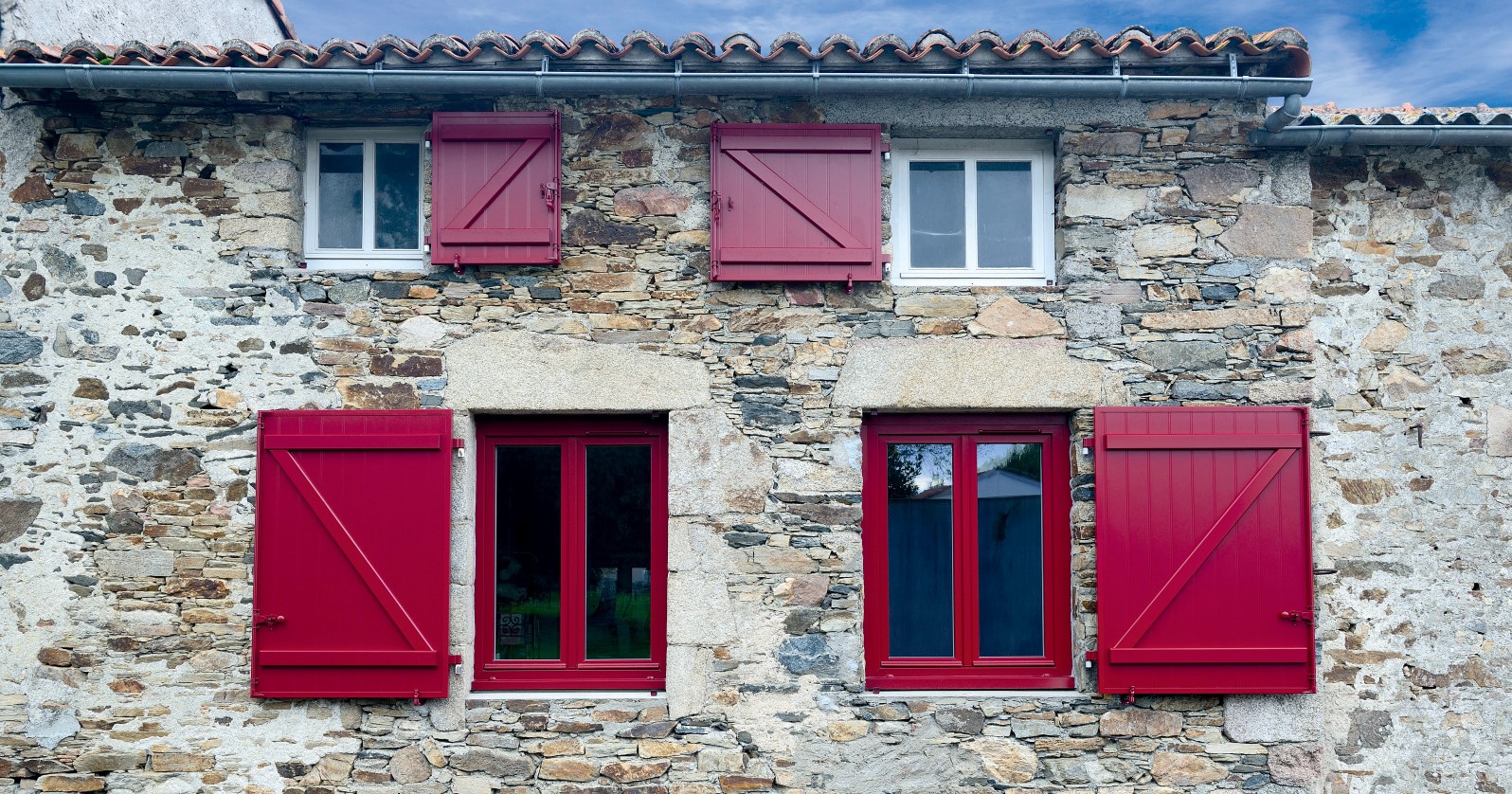 Fenêtres PVC rouges et blanches - Slider Komilfo