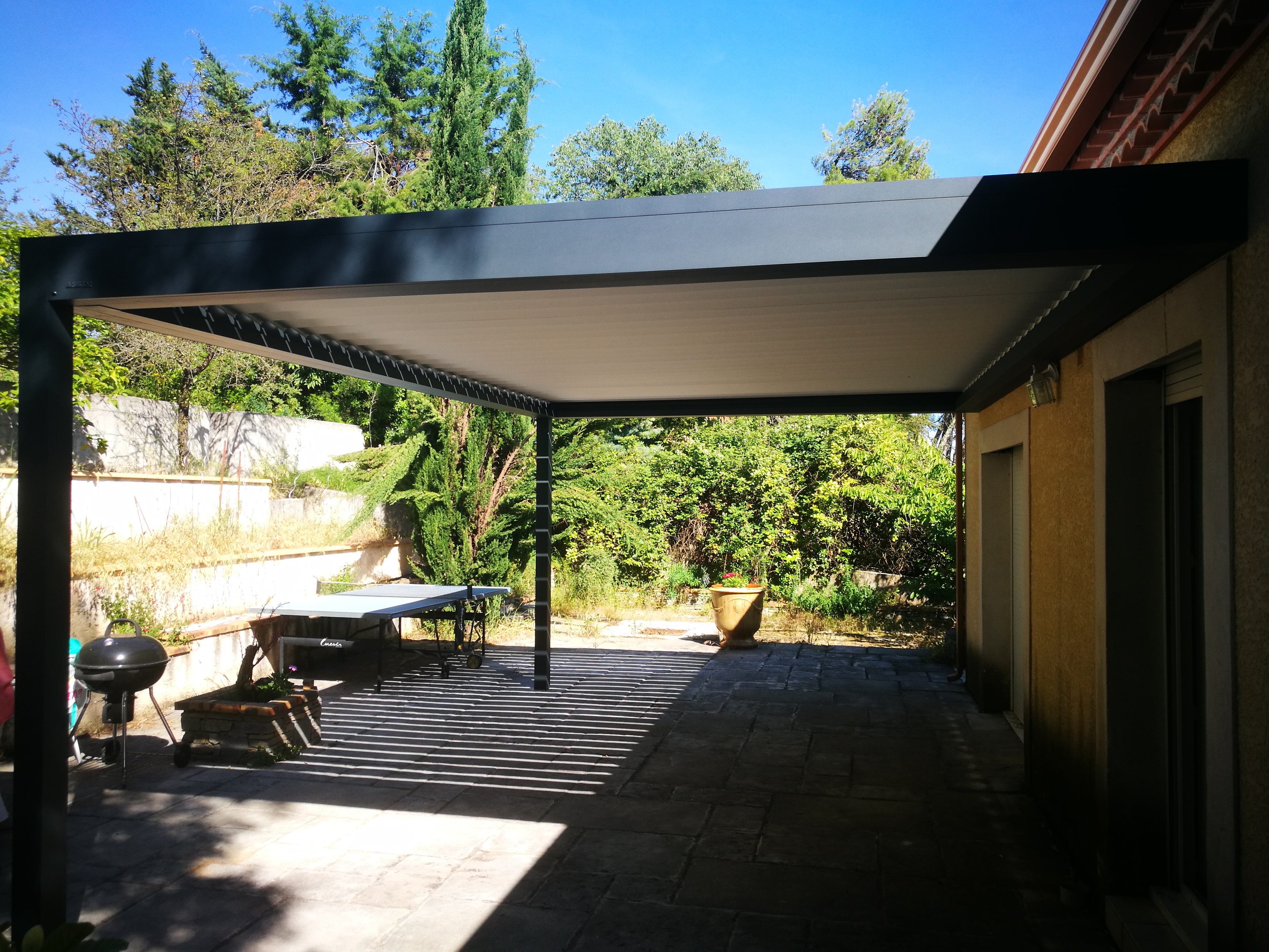 pergola bioclimatique adossée